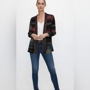Crece multi colored zigzag open shrug sweater